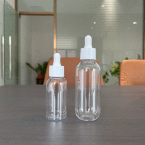 30ml 100ml clear round shoulder custom logo plastic luxury essential hair oil serum body oil bottle with droppers